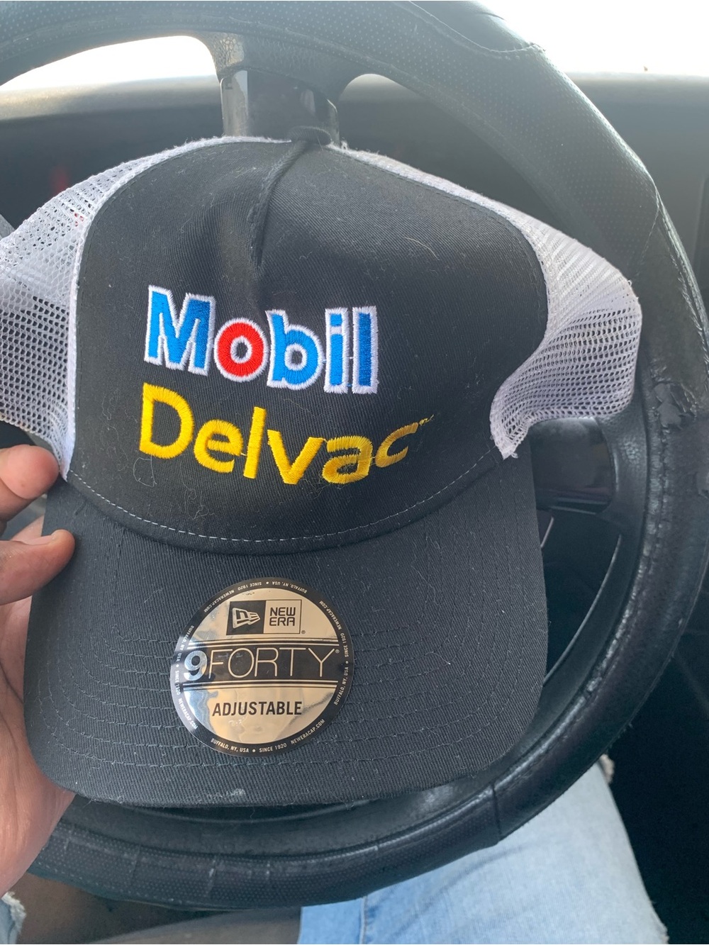 New Era Black and White Mobil Delvac Embroidered Trucker Cap